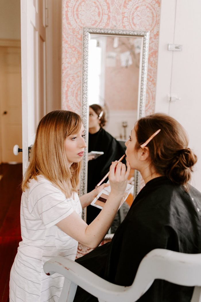 Bride Getting Her Bridal Makeup Done Before Her Wedding