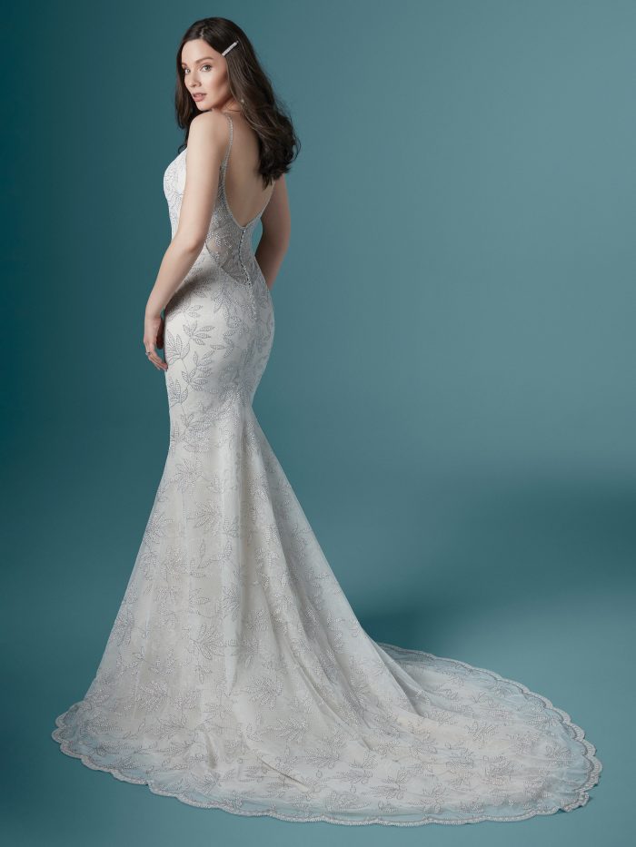 Model Wearing Sparkly Wedding Gown with Silver Accents Called Demi by Maggie Sottero