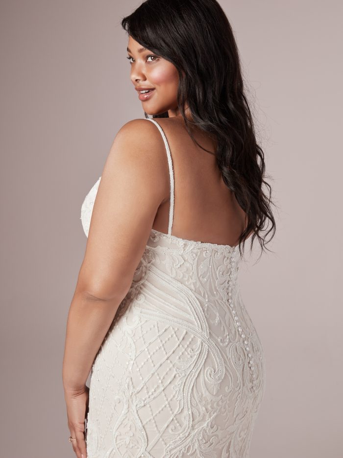 Model Wearing Plus Size Blush Wedding Gown Called Corrine by Rebecca Ingram