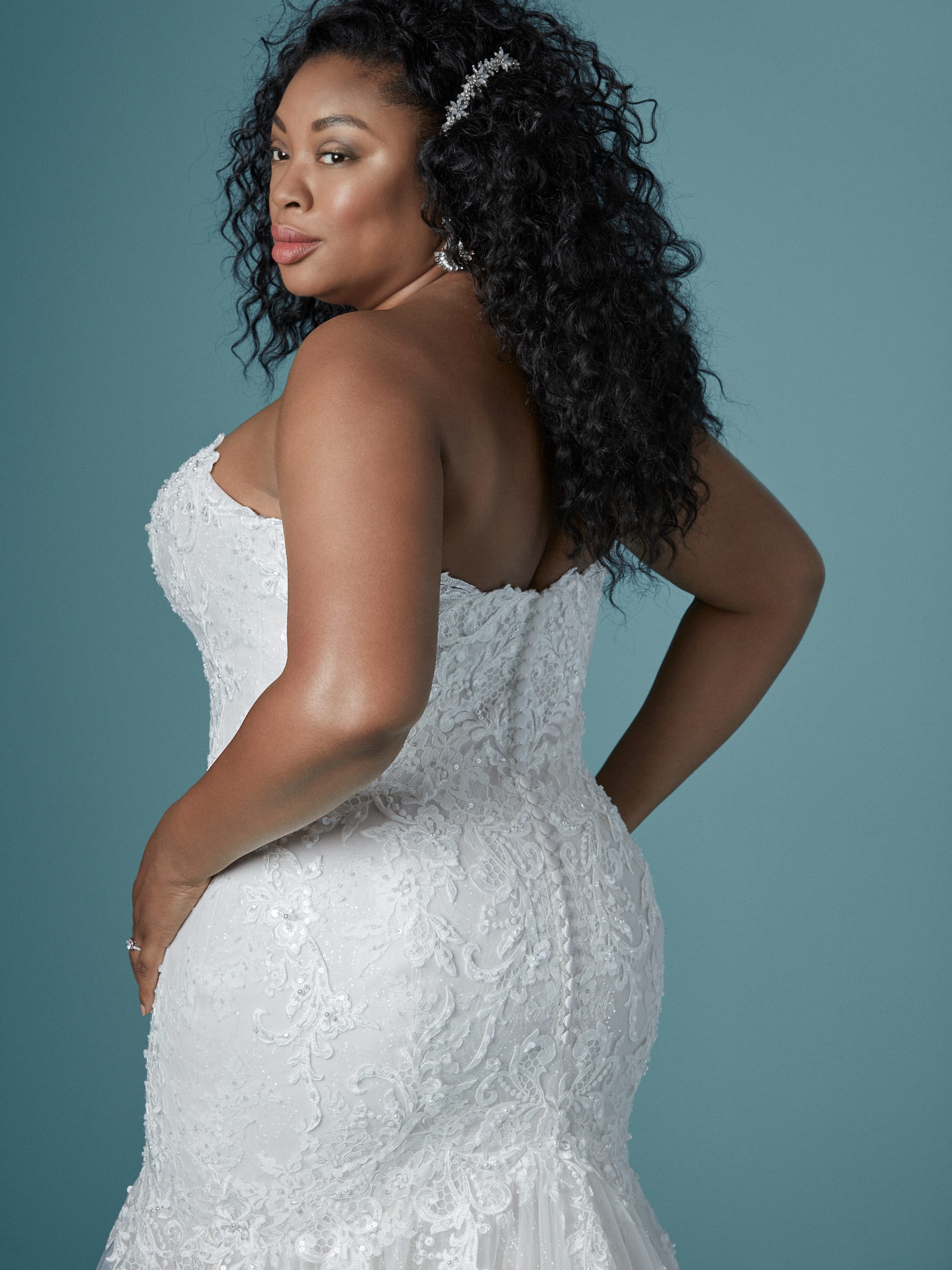 Model Wearing Plus Size Mermaid Wedding Gown Called Lonnie Lynette by Maggie Sottero