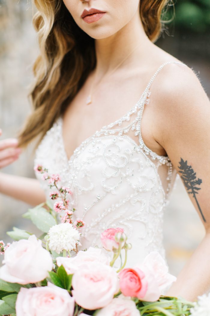 Pink bouquet and Bride wearing a Beading Maggie Sottero Wedding Dress