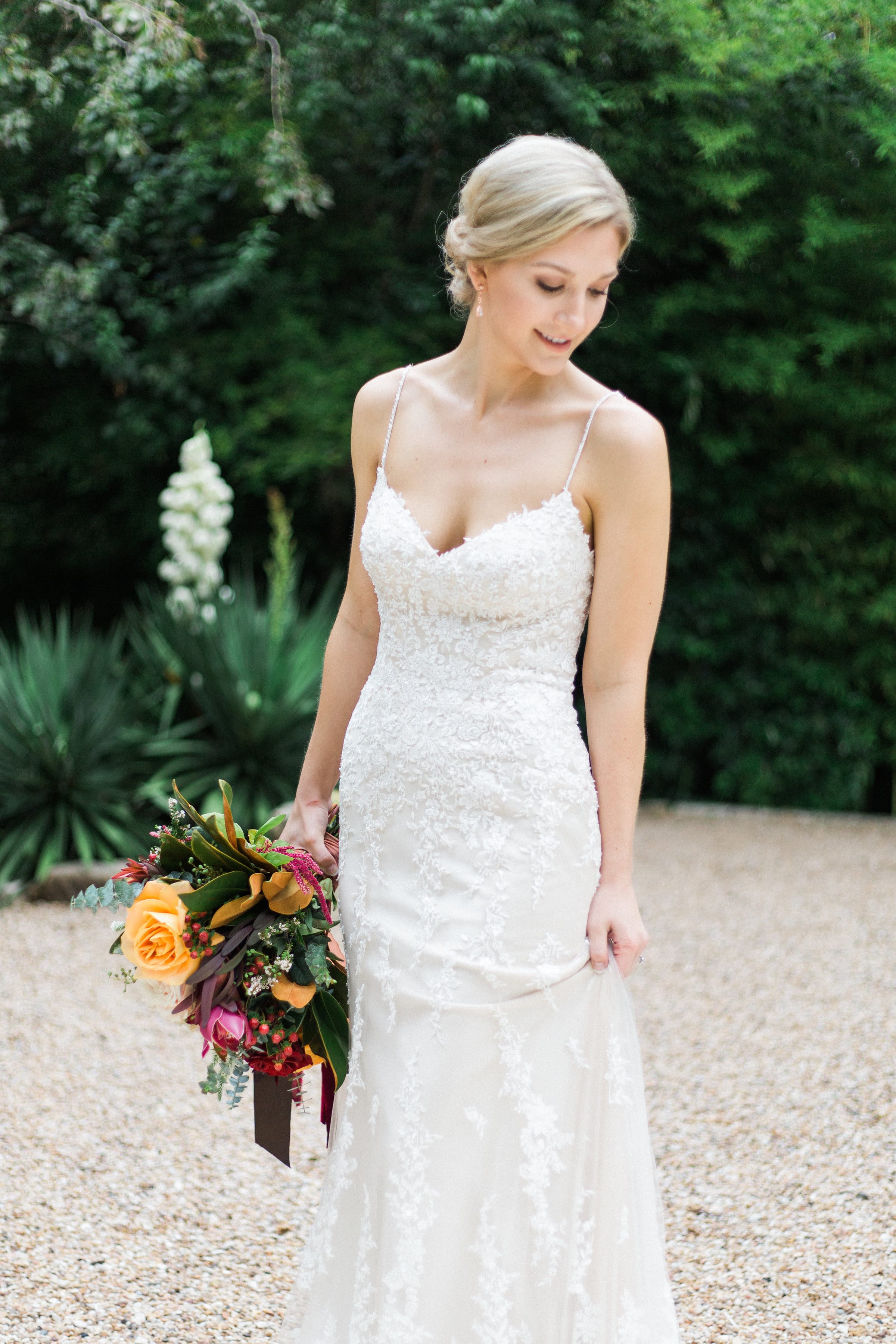 Gorgeous Outdoor Wedding Featuring Jewel Tones and Shimmery Lace Gown. Sarah wore the Nola wedding dress by Maggie Sottero.