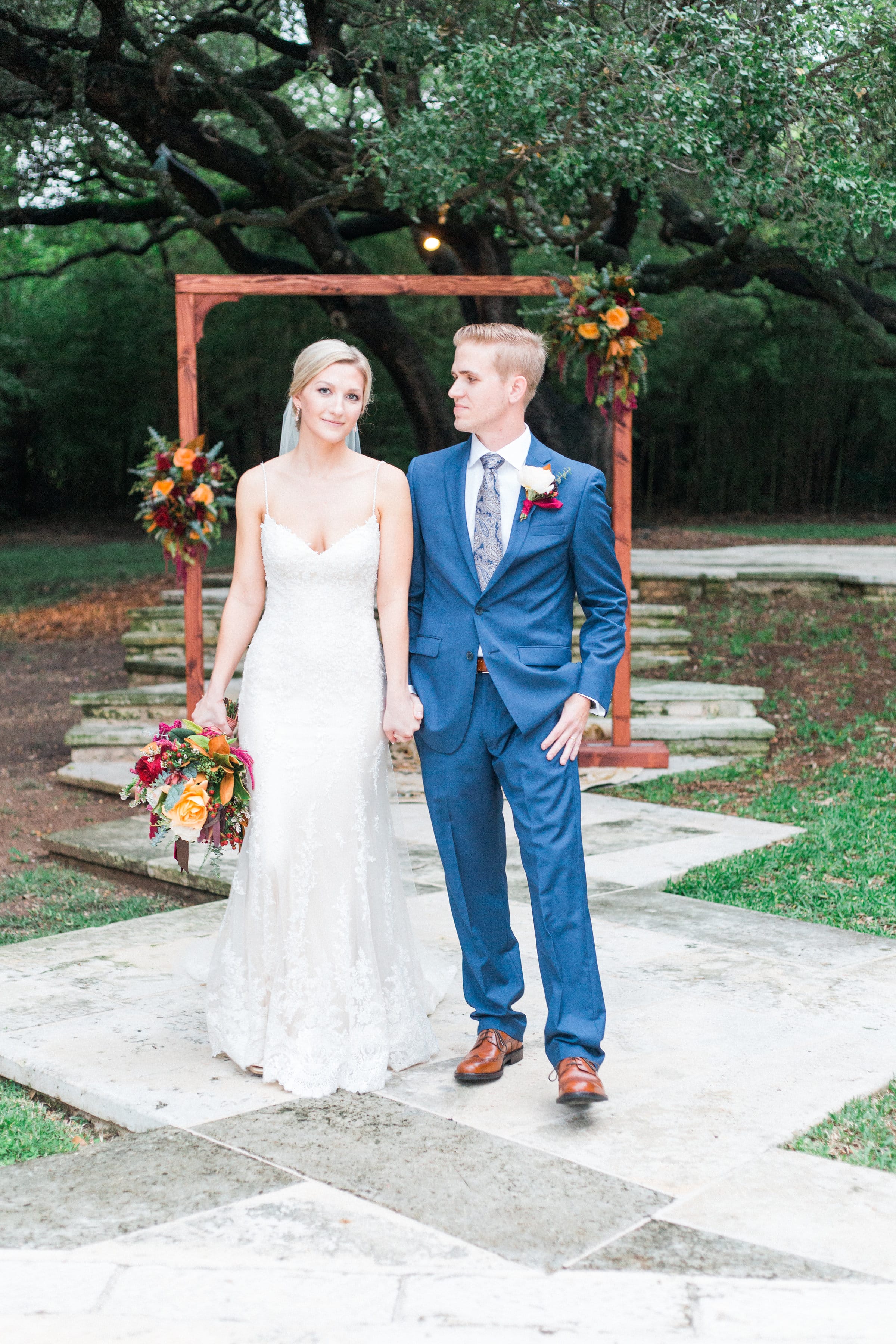 Gorgeous Outdoor Wedding Featuring Jewel Tones and Shimmery Lace Gown. Sarah wore the Nola wedding dress by Maggie Sottero.