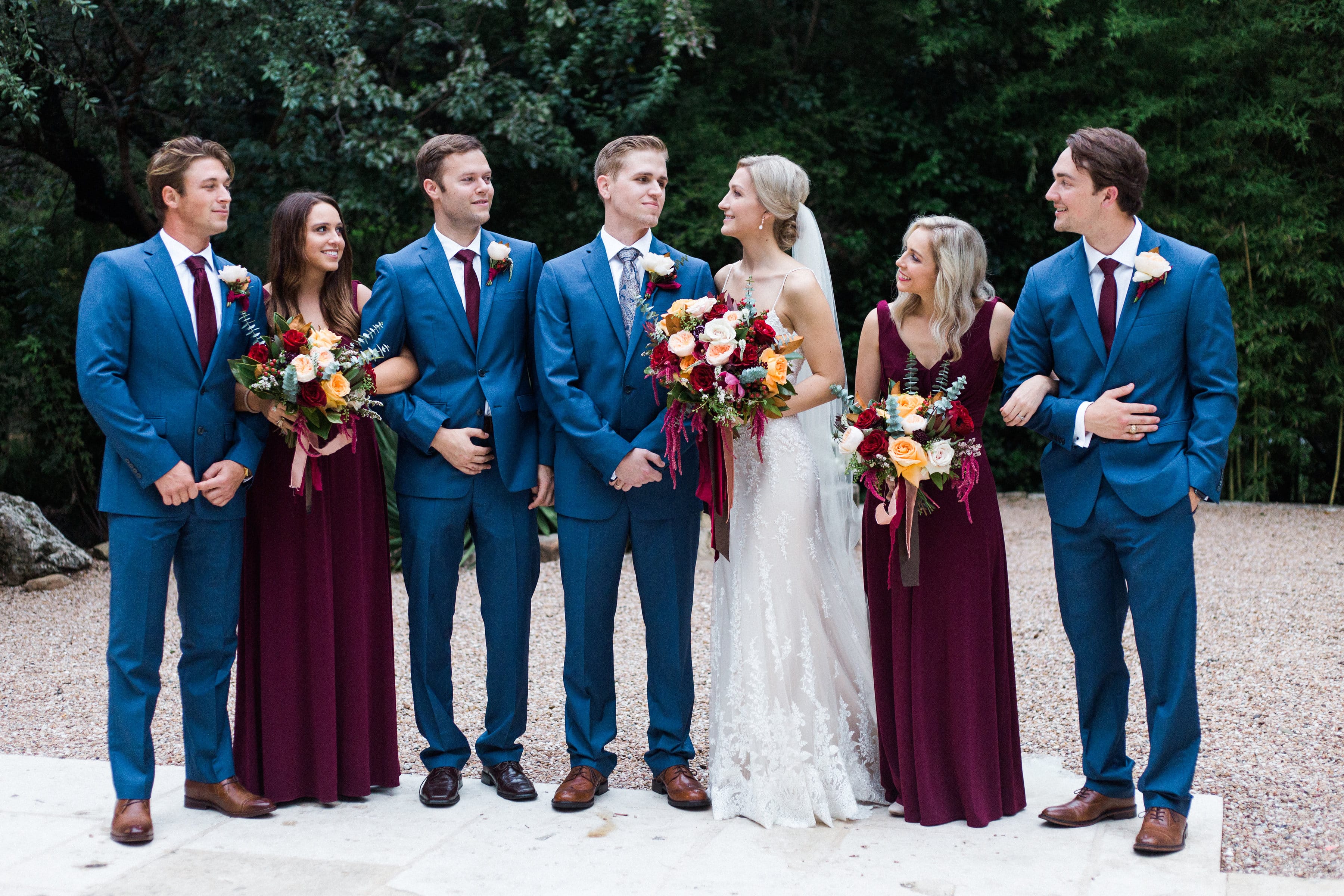 Real Bride and Groom Standing with Wedding Party