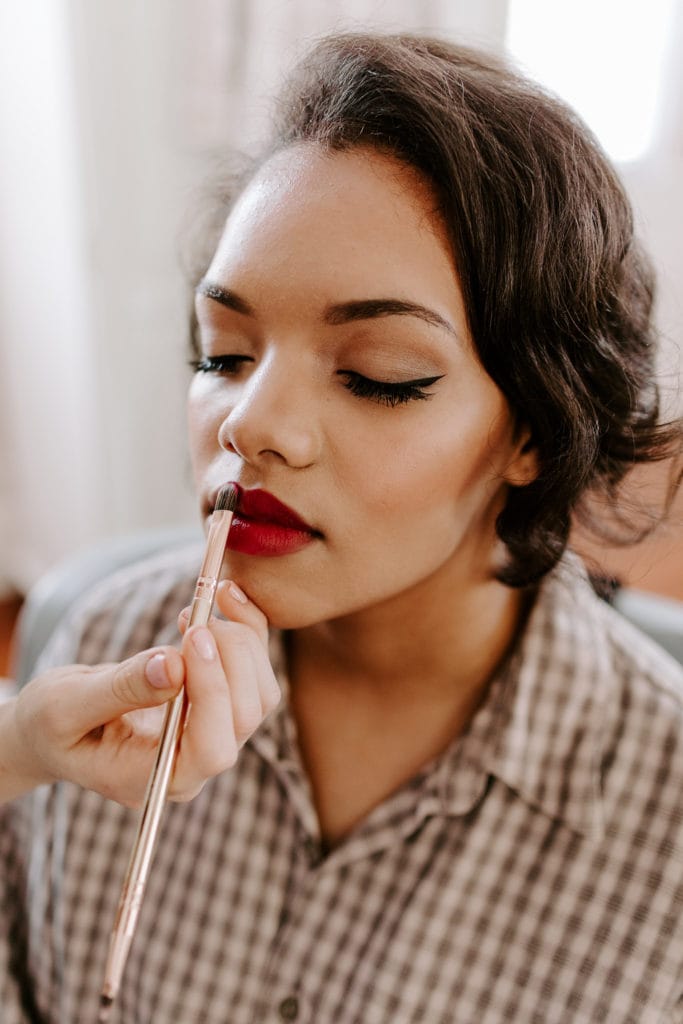 Bride Putting on Wedding Makeup