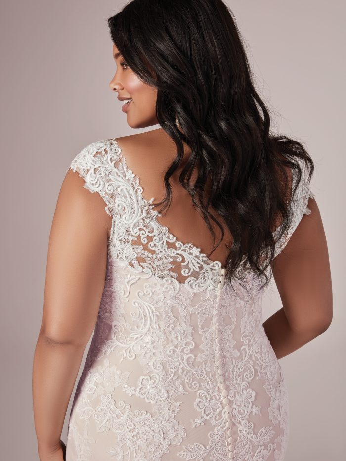Model Wearing Plus Size Wedding Dress Called Daphne Lynette by Rebecca Ingram