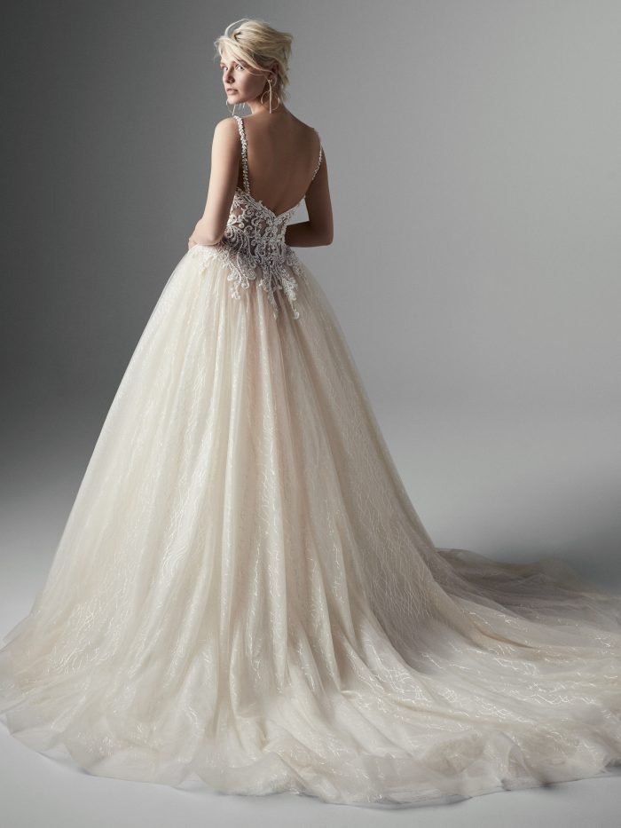 Model Wearing Blush Ball Gown Wedding Dress Called Tate by Sottero and Midgley
