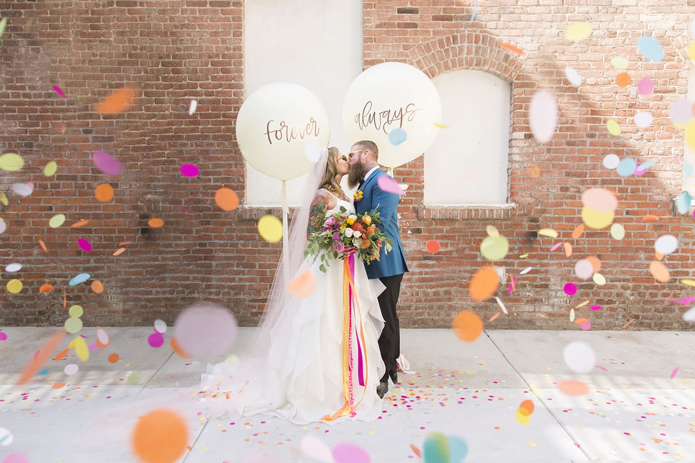 Punchy Citrus and Confetti-Themed Styled Shoot Featuring Blaire by Sottero & Midgley.