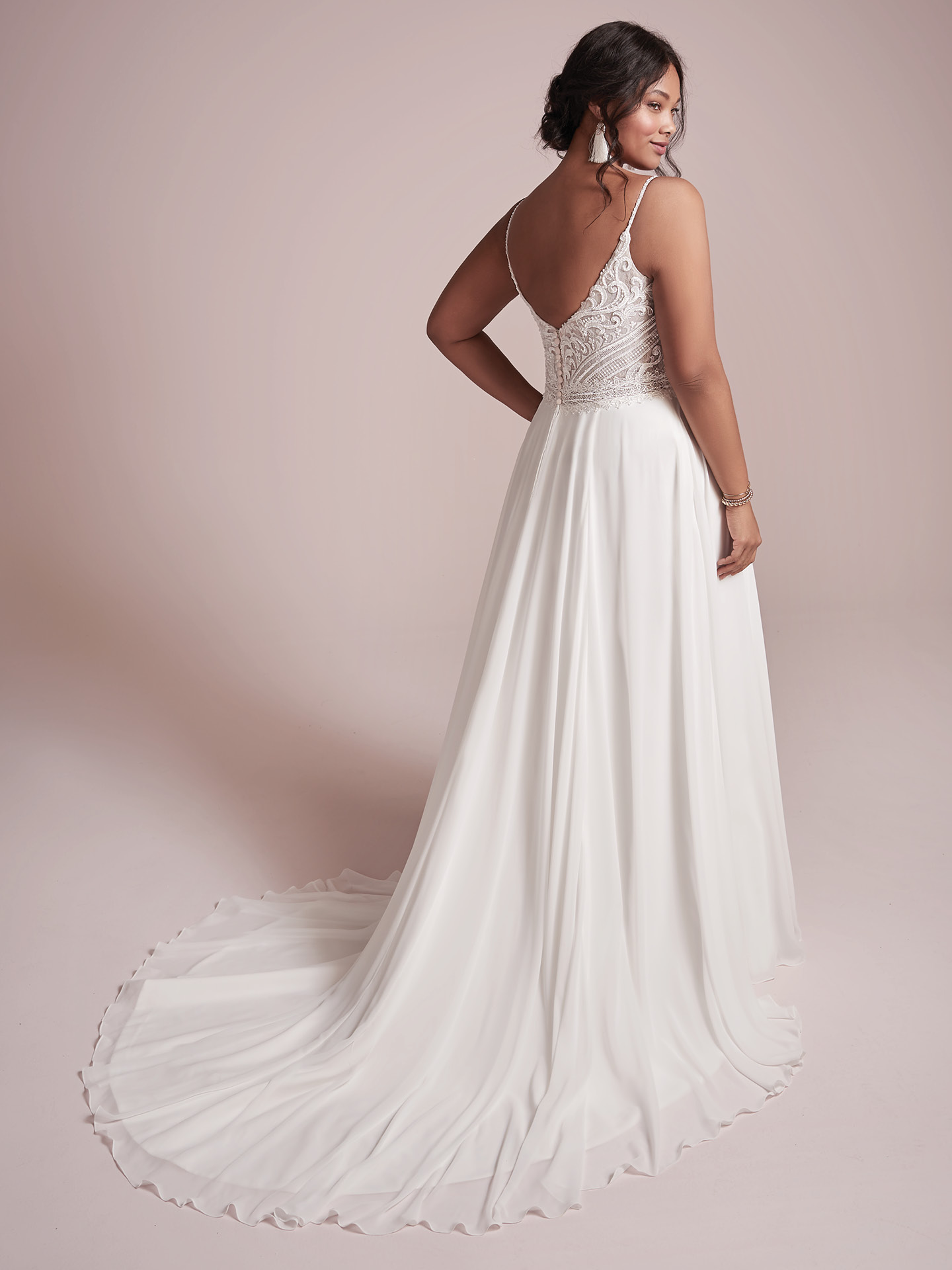 Curvy Model Wearing Plus Size Beach Chiffon Wedding Gown Called Lorrained by Rebecca Ingram