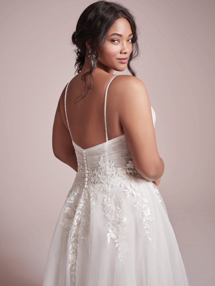 Plus Size Model Wearing Lightweight A-line Wedding Dress Called Mila by Rebecca Ingram