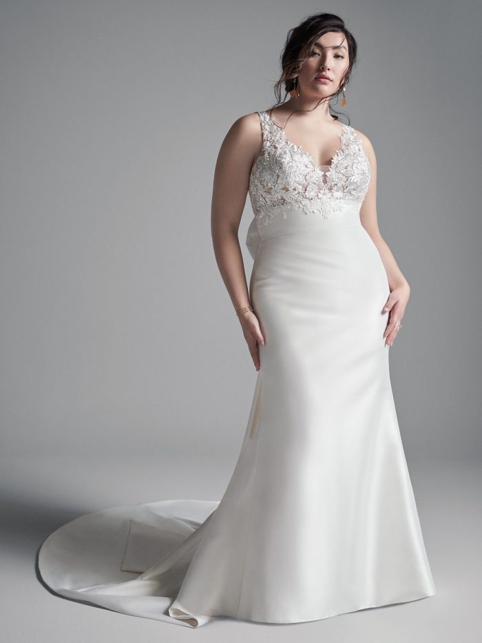 Curvy Model Wearing Plus Size Satin Sheath Wedding Dress Called Boden by Sottero and Midgley