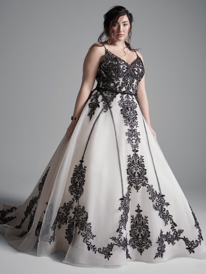 Curvy Model Wearing Plus Size Black Lace Wedding Dress Called Santiago by Sottero and Midgley