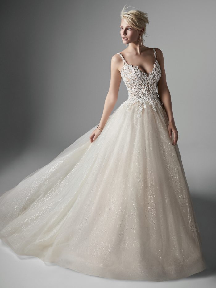 Model Wearing Blush Ball Gown Wedding Dress Called Tate by Sottero and Midgley