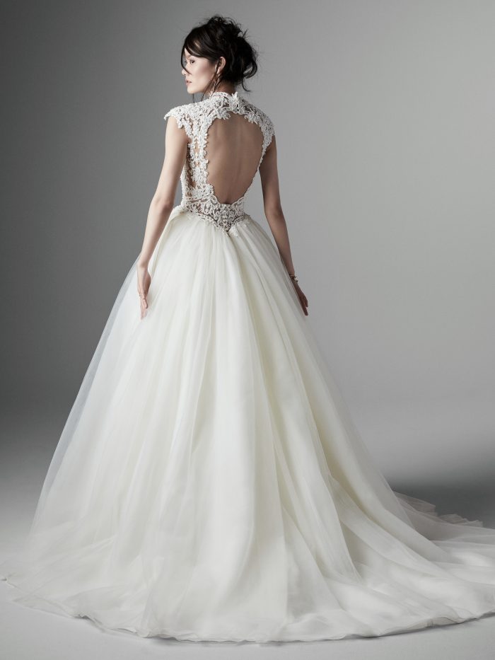 Model Wearing Keyhole Ball Gown Wedding Dress Called Zinnia Lane by Sottero and Midgley