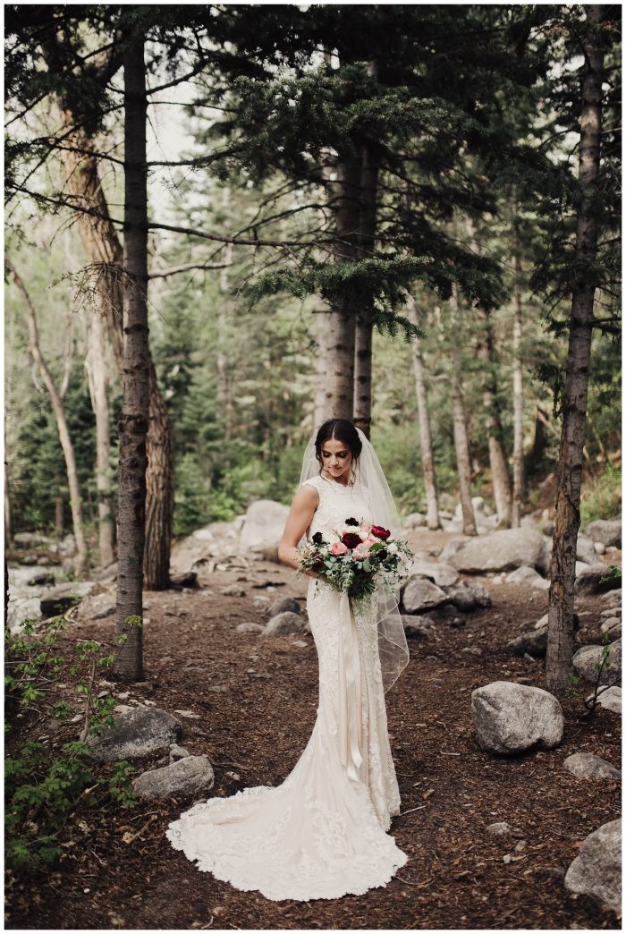 Real Bride Wearing Modest Sheath Wedding Dress Called Suzanne Rose by Sottero and Midgley in Forest