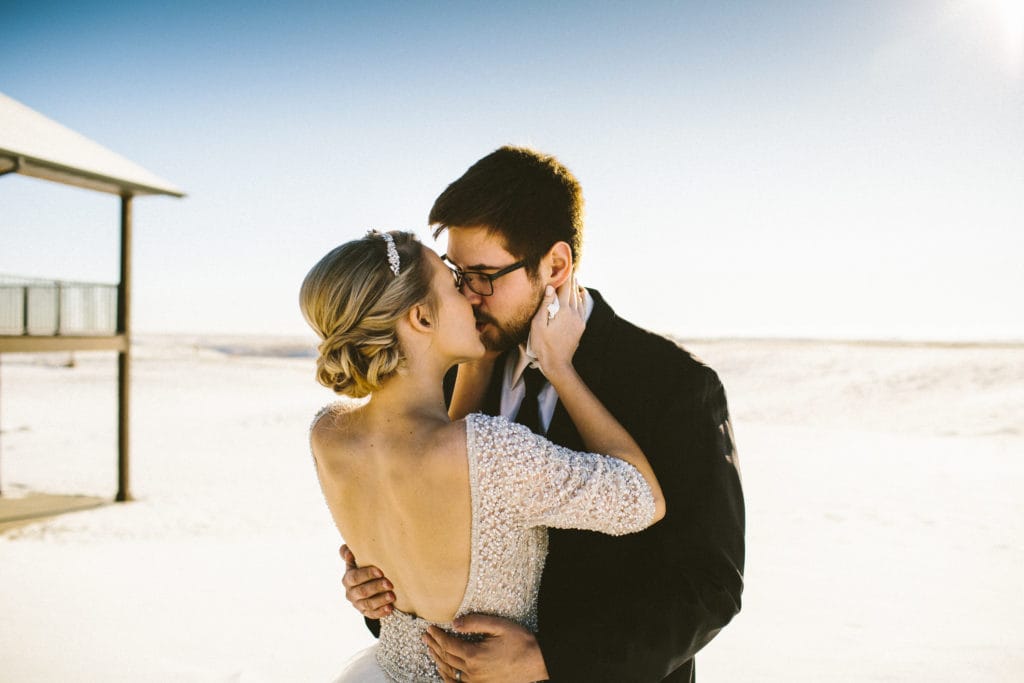 Groom with Real Bride Twirling and Wearing Ball Gown Wedding Dress Called Allen by Sottero and Midgley