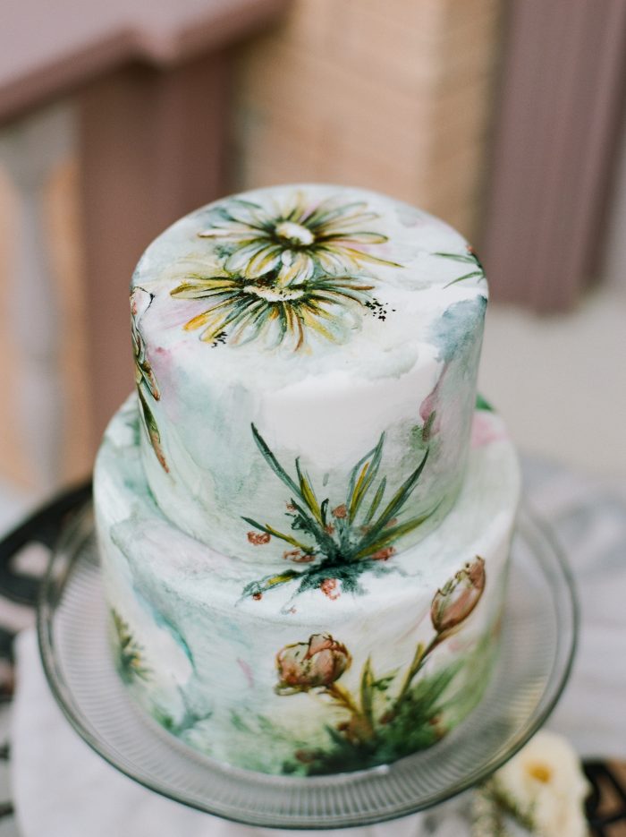 A photo of a vintage style cake at a vintage style wedding.