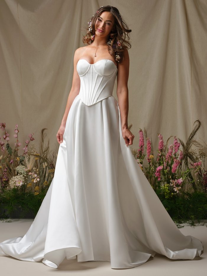 Rebecca Ingram Alexia A-line wedding dress featuring a strapless corset bodice, sweetheart neckline, and smooth satin skirt.