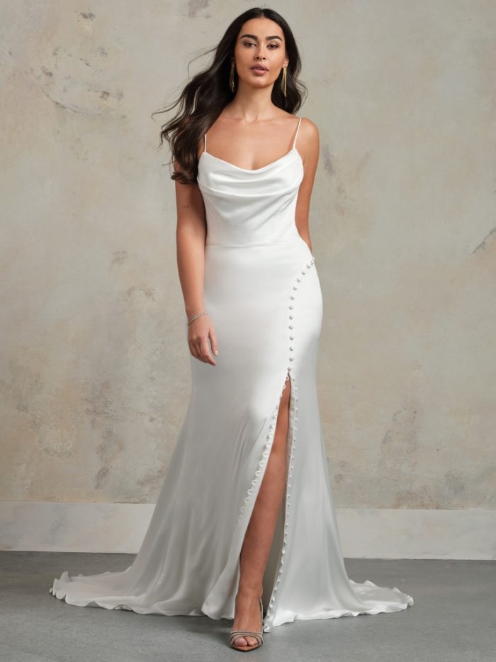 Back view of Rebecca Ingram Allison wedding dress featuring a lace-up corset back, 3D floral details, and a flowing tulle train.