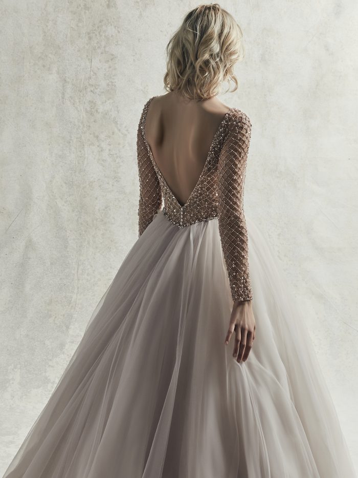Model Wearing Beaded Long Sleeve Ball Gown Wedding Dress Called Fitzgerald by Sottero and Midgley