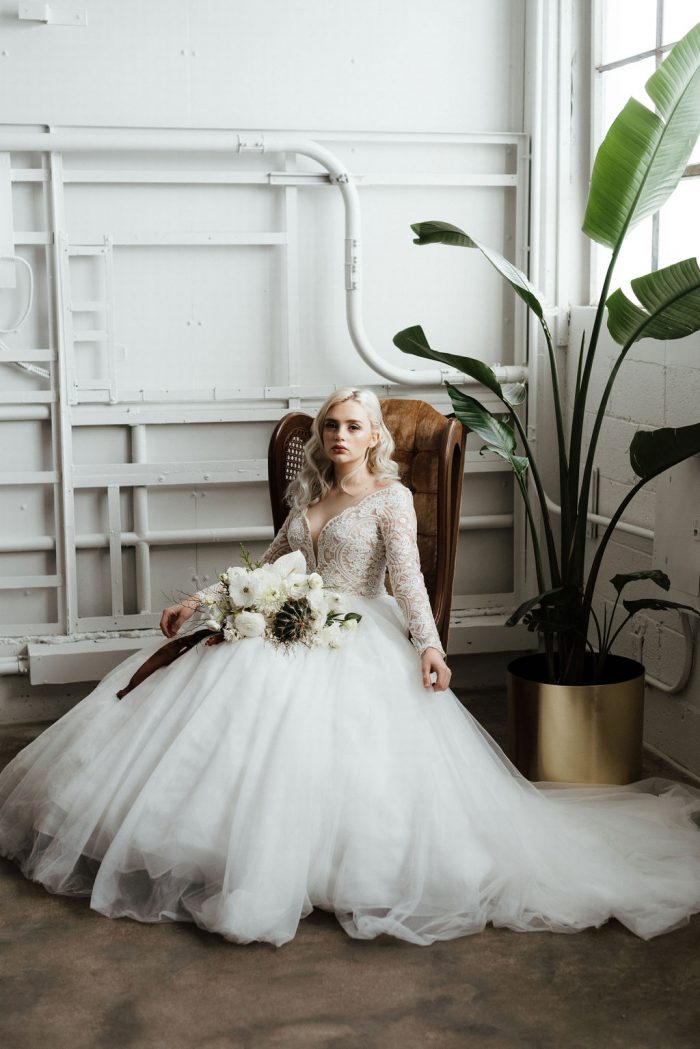Model Wearing Scalloped Ball Gown Wedding Dress Called Mallory Dawn by Maggie Sottero