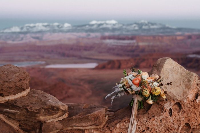 Bouquet sitting on red rocks in Moab Utah