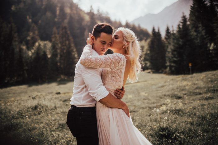 Groom with Real Bride Wearing Lace Wedding Dress by Maggie Sottero at Destination Elopement in Slovenia