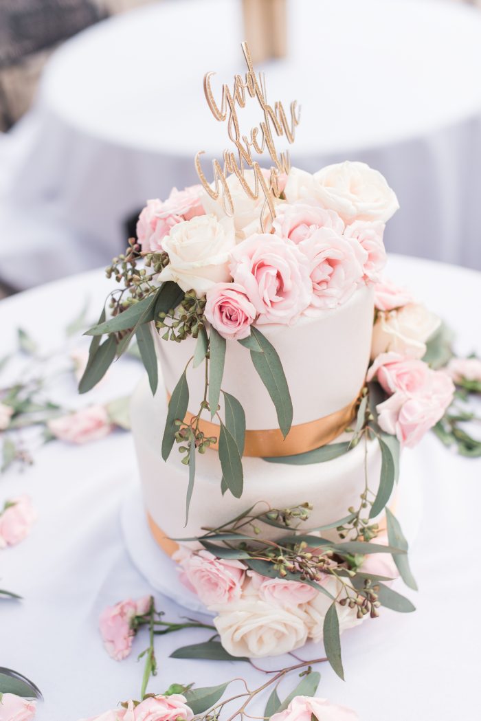 Blush floral and gold wedding cake