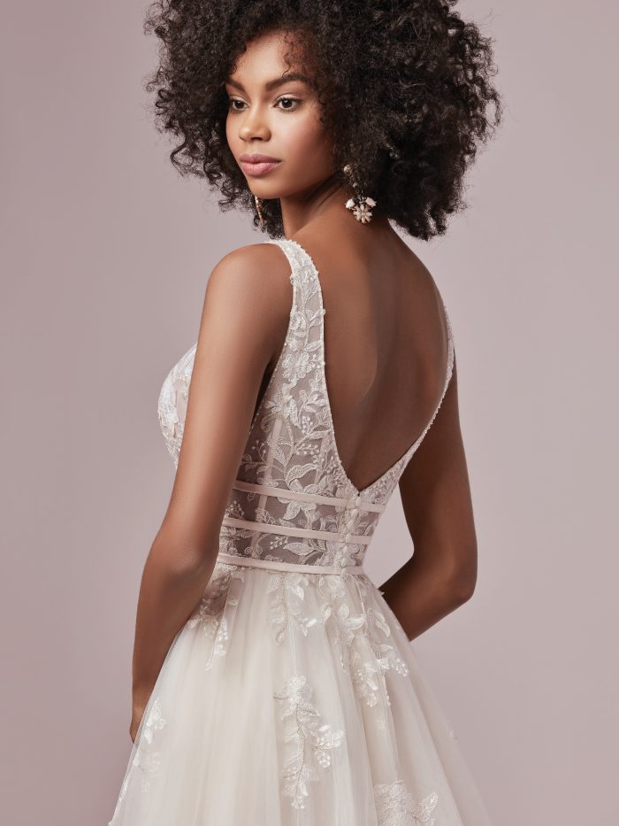 Black Model Wearing Raelynn Affordable Lace Wedding Dress by Rebecca Ingram