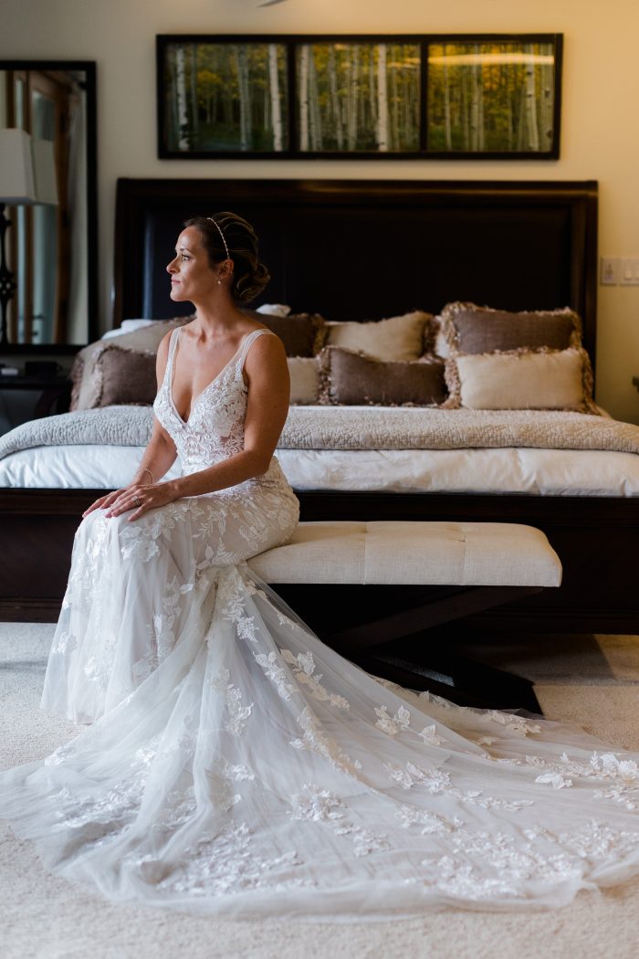 Bride In Lace Wedding Dress With V-Neckline Called Greenley By Maggie Sottero 