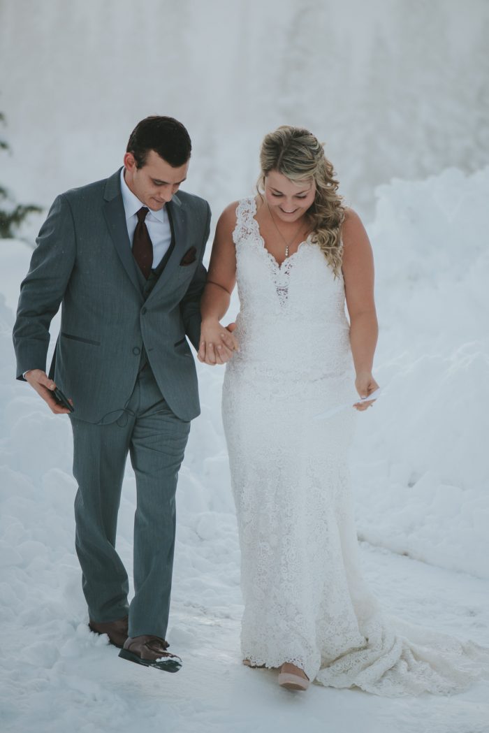 Groom with Real Bride in Snow Wearing Lace Wedding Dress Called Hope by Rebecca Ingram