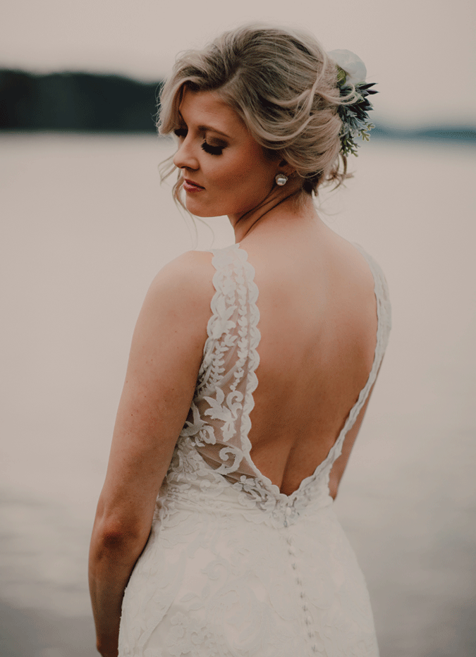 Bride Wearing Backless Wedding Dress Called Winifred by Sottero and Midgley