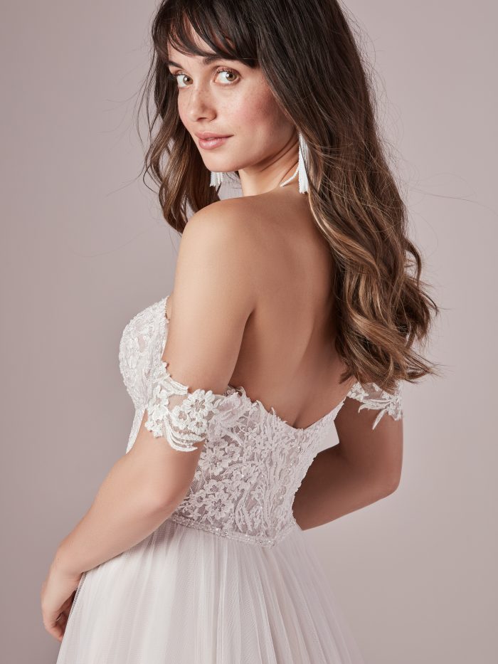 Model Wearing Off the Shoulder Tulle Wedding Gown Called Nia by Rebecca Ingram