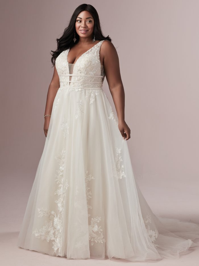 Plus Size Model Wearing Boho A-line Wedding Dress Called Raelynn Lynette by Rebecca Ingram