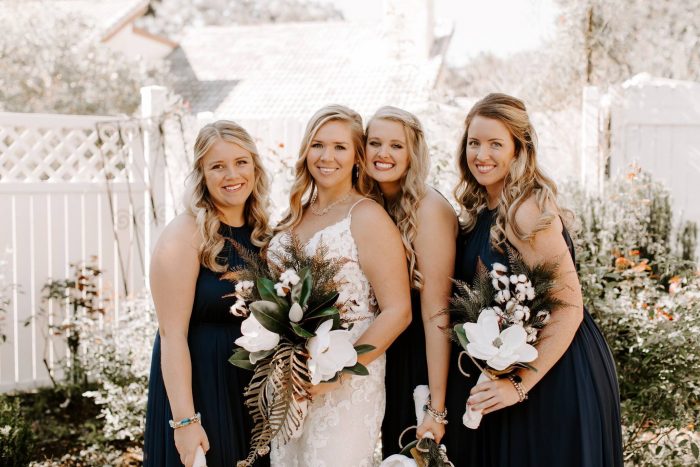 Bride and Bridesmaids with Bride wearing Tuscany Lynette wedding dress