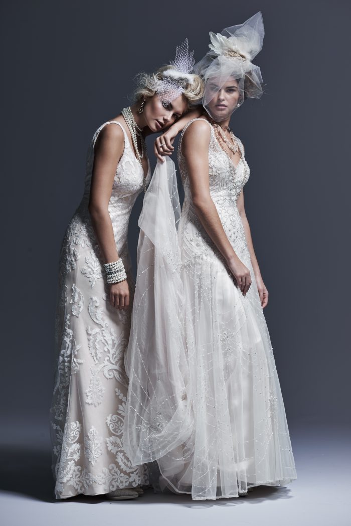 Two Models Wearing Two Sheath Wedding Gowns by Maggie Sottero