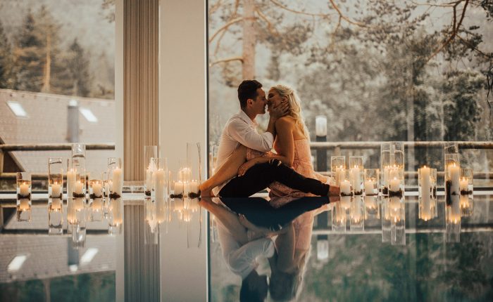 Real groom with real bride kissing before their wedding