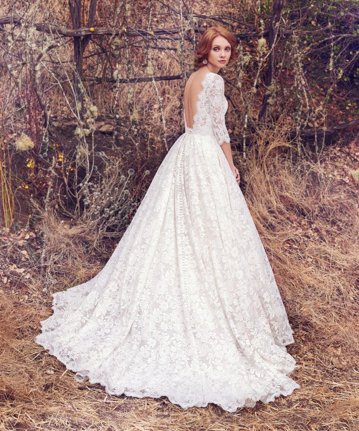 Model Wearing Lace Backless Ball Gown Wedding Dress Called Cordelia by Maggie Sottero