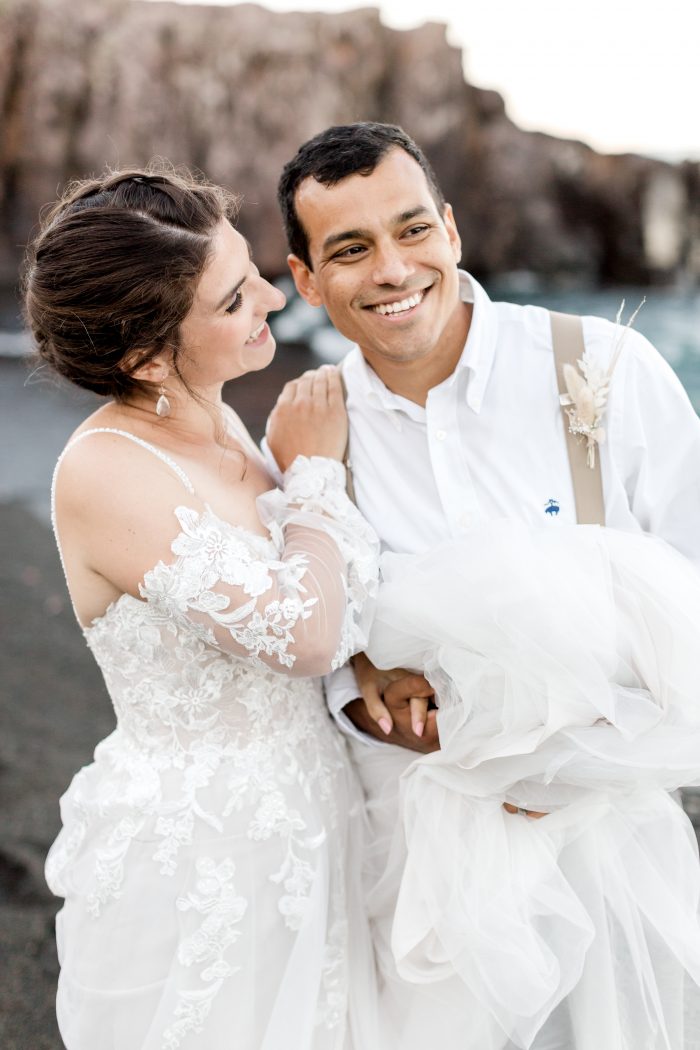 Groom on Beach with Real Bride Wearing Beach Boho Wedding Dress Called Stevie by Maggie Sottero