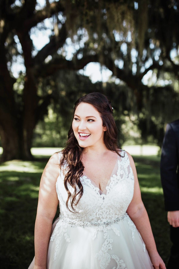 Real Bride Wearing Maggie Sottero Wedding Dress with Romantic Curls