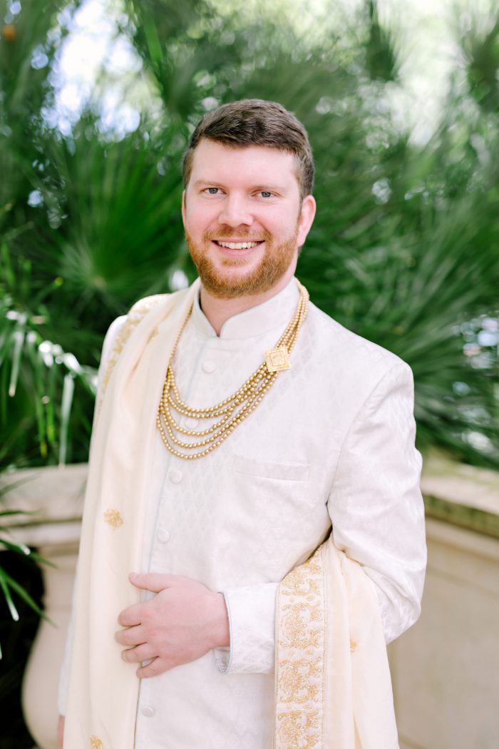 Real Groom at Indian Wedding Wearing Traditional White and Gold Sherwani