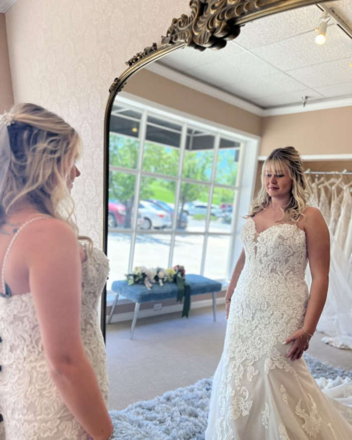 Bride wearing Albany by Maggie Sottero at a bridal boutique