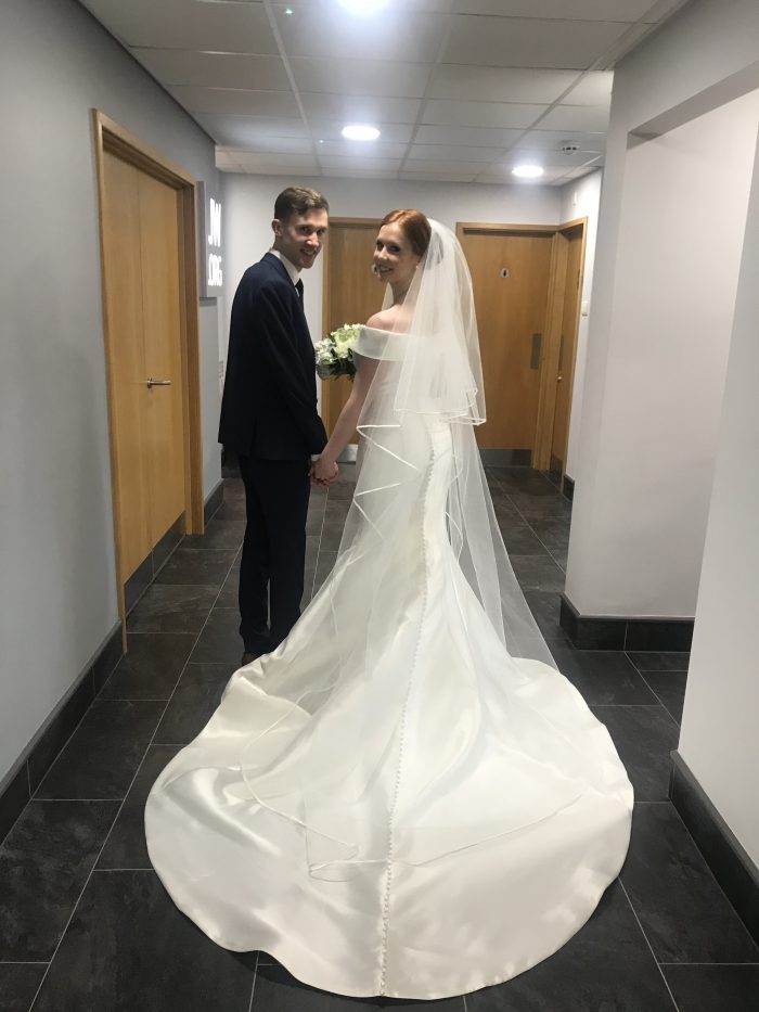 Real Bride Wearing Wedding Dress by Rebecca Ingram During Virtual Wedding While Social Distancing