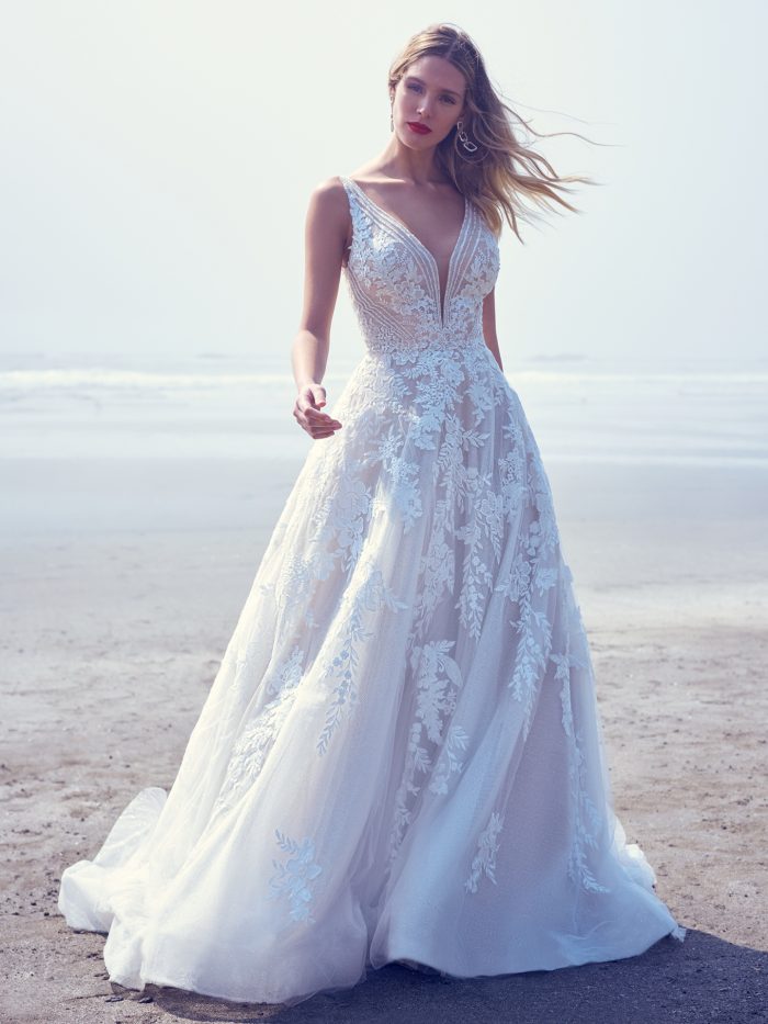 Bride Walking On Beach Wearing Glamorous A-line Wedding Dress Called Essex by Sottero and Midgley