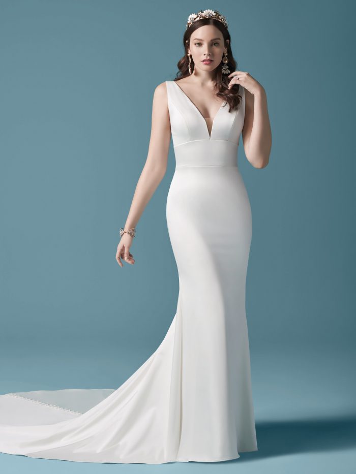 Model Wearing Crepe Sheath Wedding Dress with Long Train Called Anissa by Maggie Sottero