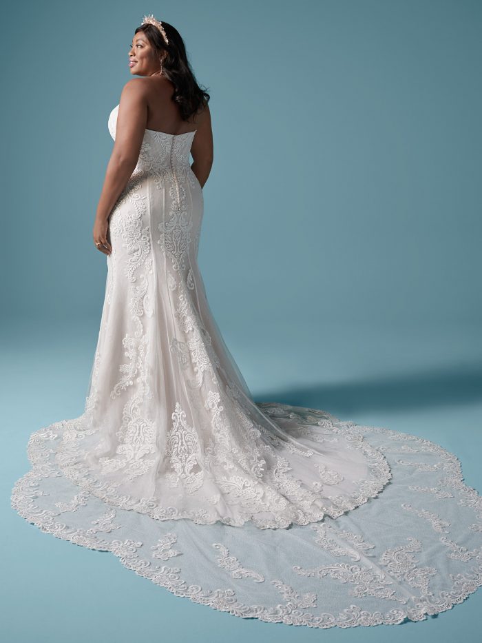 Curvy Model Wearing Strapless Plus Size Wedding Dress Called Erin Lynette Marie by Maggie Sottero