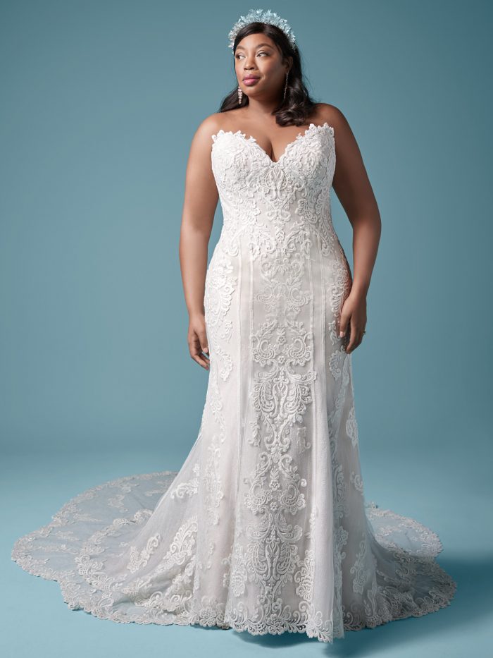 Plus Size Model Wearing Plus Size Sheath Wedding Dress Called Erin Lynette Marie by Maggie Sottero