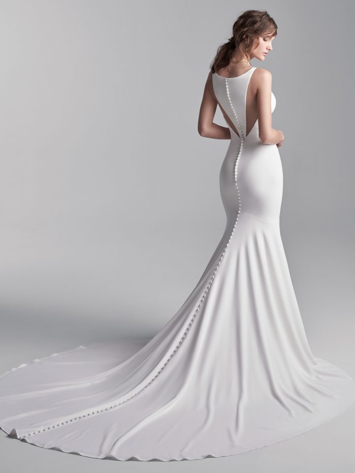 Model Wearing Dramatic Halter Back Wedding Dress Called Anthony by Sottero and Midgley