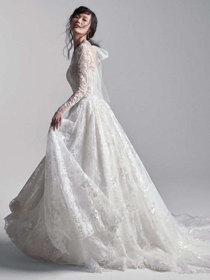 Model Wearing Long Train Princess Wedding Dress Called Xavier by Sottero and Midgley
