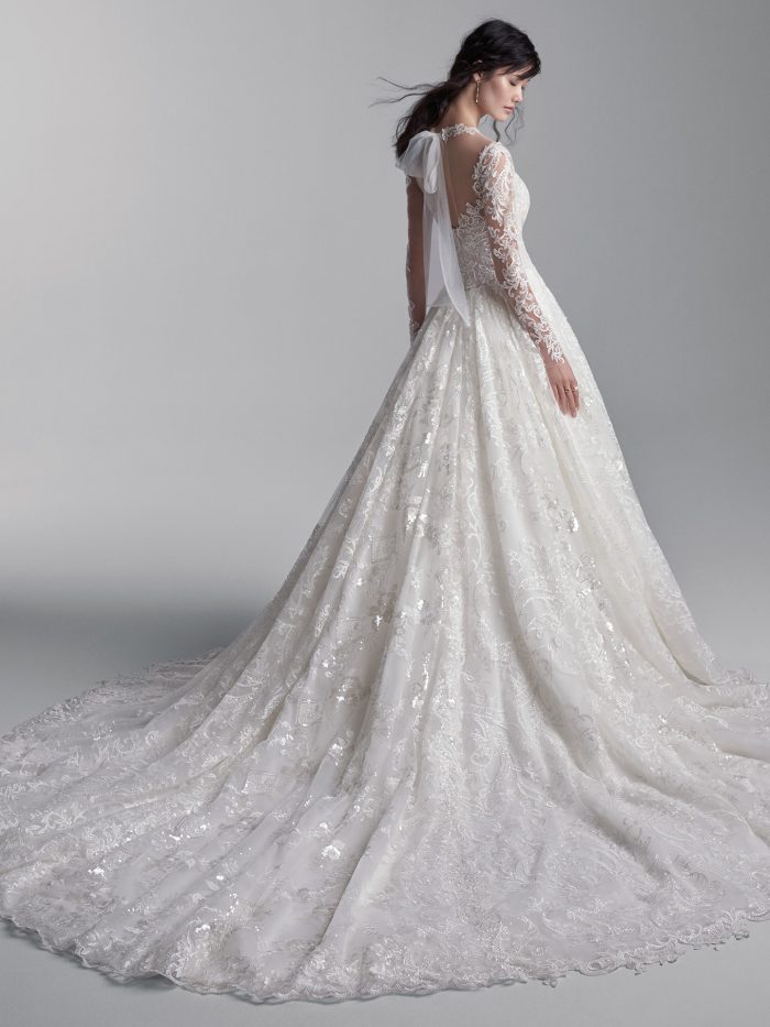 Model Wearing Long Train Princess Wedding Dress Called Xavier by Sottero and Midgley